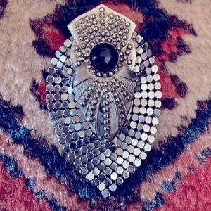 Vintage silver and onyx brooch